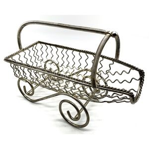 Vintage wine bottle holder wine pouring MCM

basket, made of silver color metal